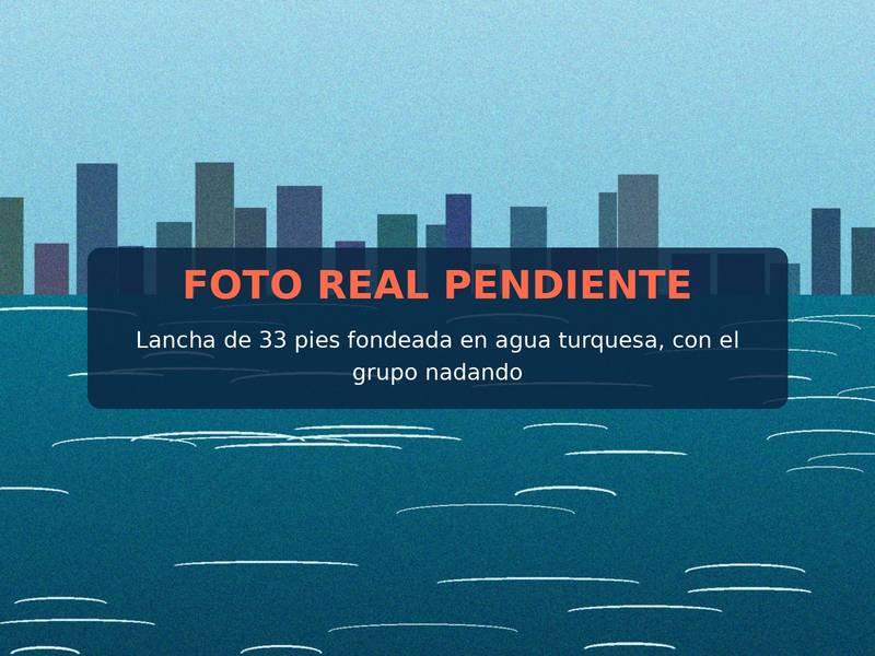 Foto provisional: lancha de 33 pies fondeada en agua turquesa